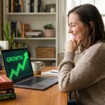 Beginner investor smiling while reviewing an investment app on their phone